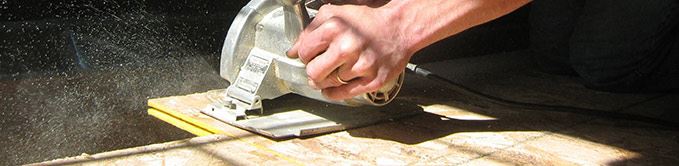 Person Using Hand Saw