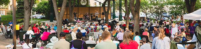 Citizens Sitting Around at Music Festival