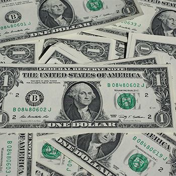 Scattered dollar bills